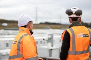 Aggreko staff in orange high vis