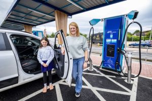 Lynsey Campbell and her daughter Iona8 are the first members of the public to arrive and charge their car at the new Myrekirk EV Charging Hub in Dundee 2