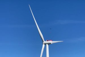 wind turbine against blue sky
