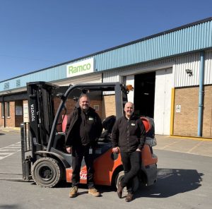 Ramco - Adrian Foreman (left) and Liam Cameron (right) standing by forklift