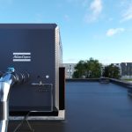 How can free cooling improve industrial chiller efficiency?