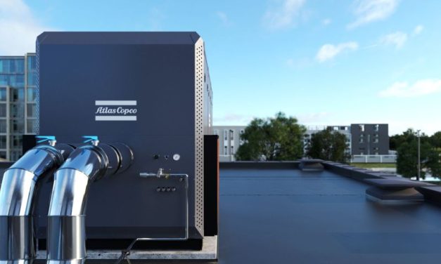How can free cooling improve industrial chiller efficiency?
